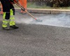Modernizace trati. Pokládka litého asfaltu na komunikaci pod mostem, instalace zábradlí i veřejného osvětlení. 7.12.2020